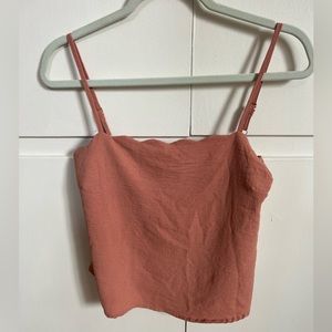 Coral-colored shirt